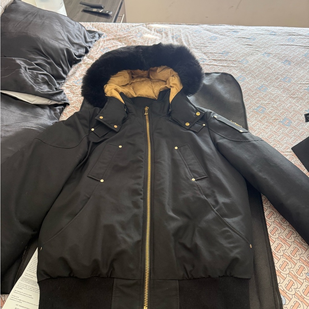 Moose Knuckles Black and Gold Bomber Jacket
